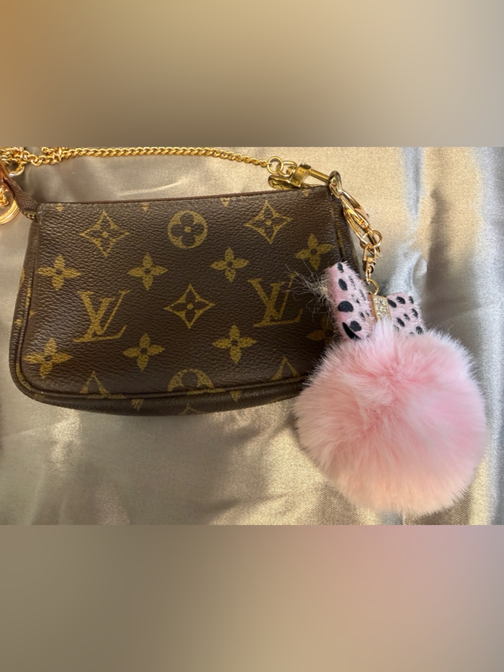 Louis Vuitton Brown Monogram Mini Bag with Pink Fur Pom Charm